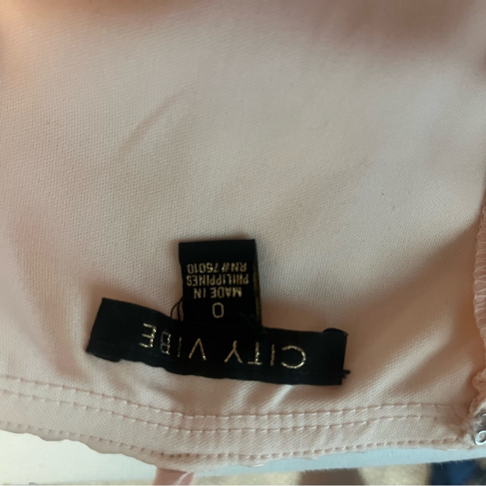 Size 0 super cute light pink mini dress. Halter top, fits according to size - Picture 3 of 3